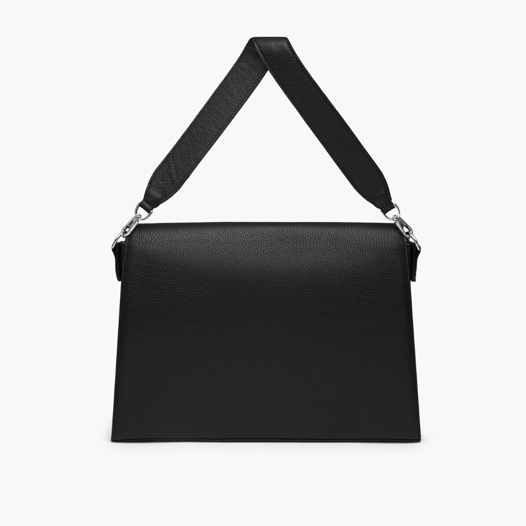 A black laptop bag with grained leather and silver metalware. It has a detachable shoulder strap. 