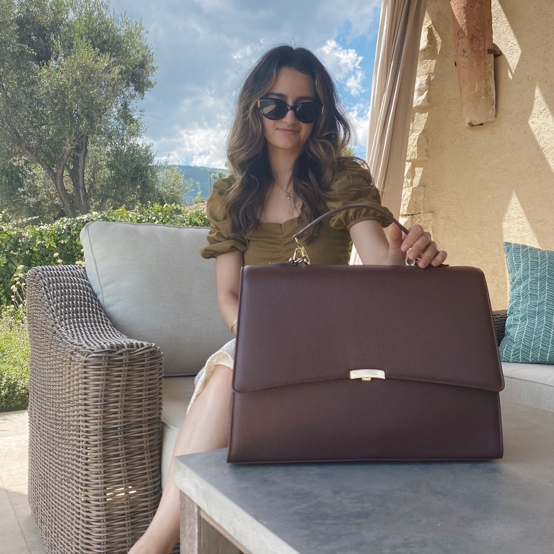 Business women having vacation in France with work and laptop bag
