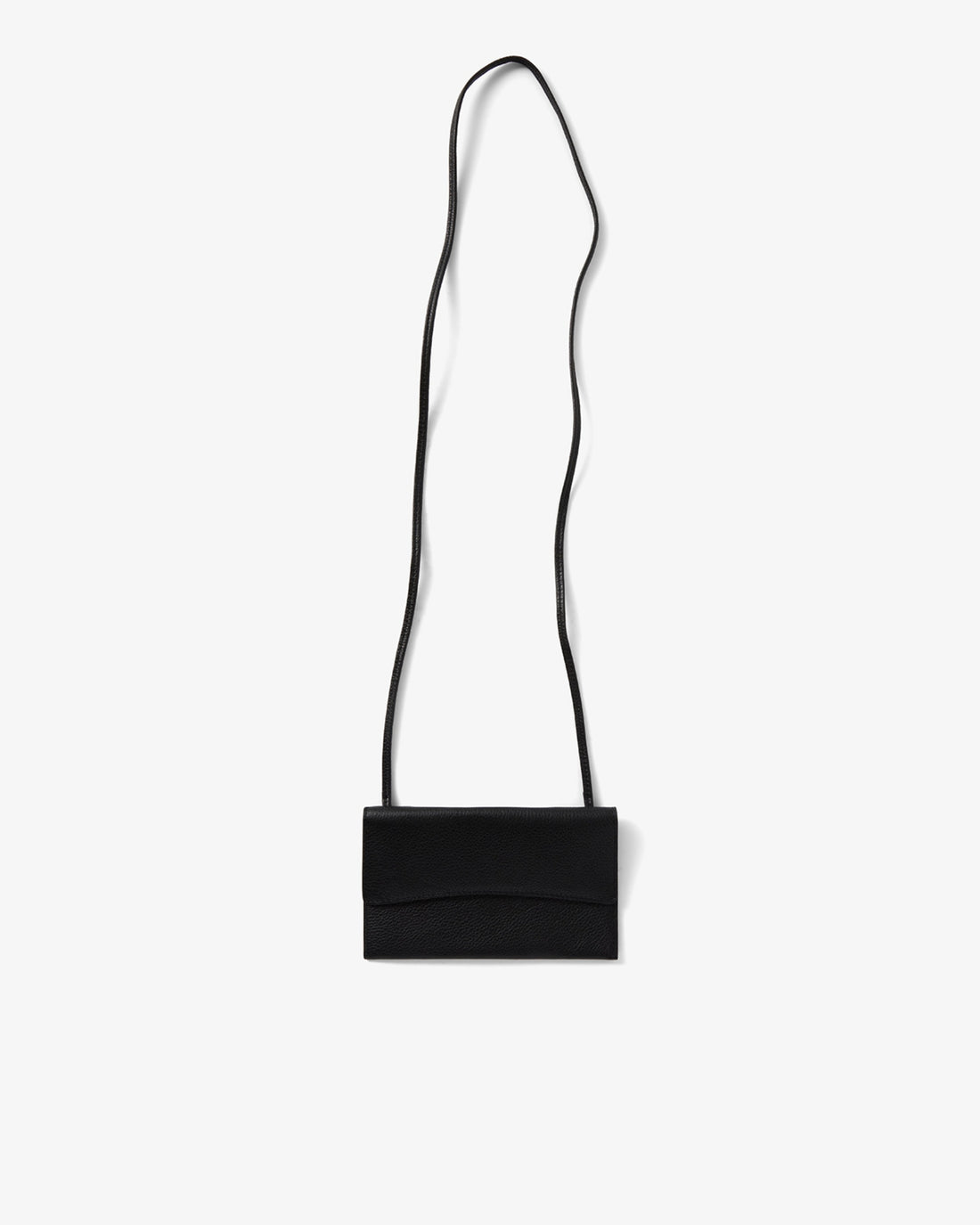 A minimalist black leather crossbody bag with a slim, long strap, shown against a plain light gray background.