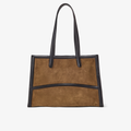 The Capacious Tote in the color Pecan/Gold. A structured suede and leather tote bag featuring elegant double handles and a curved exterior leather details. 