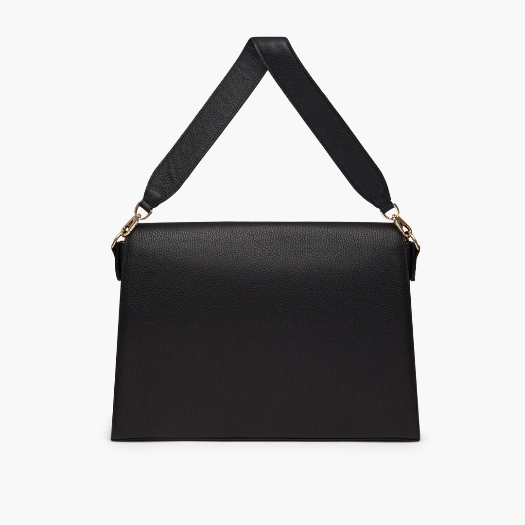 A black laptop bag with grained leather and light gold metalware. It has a detachable shoulder strap. 