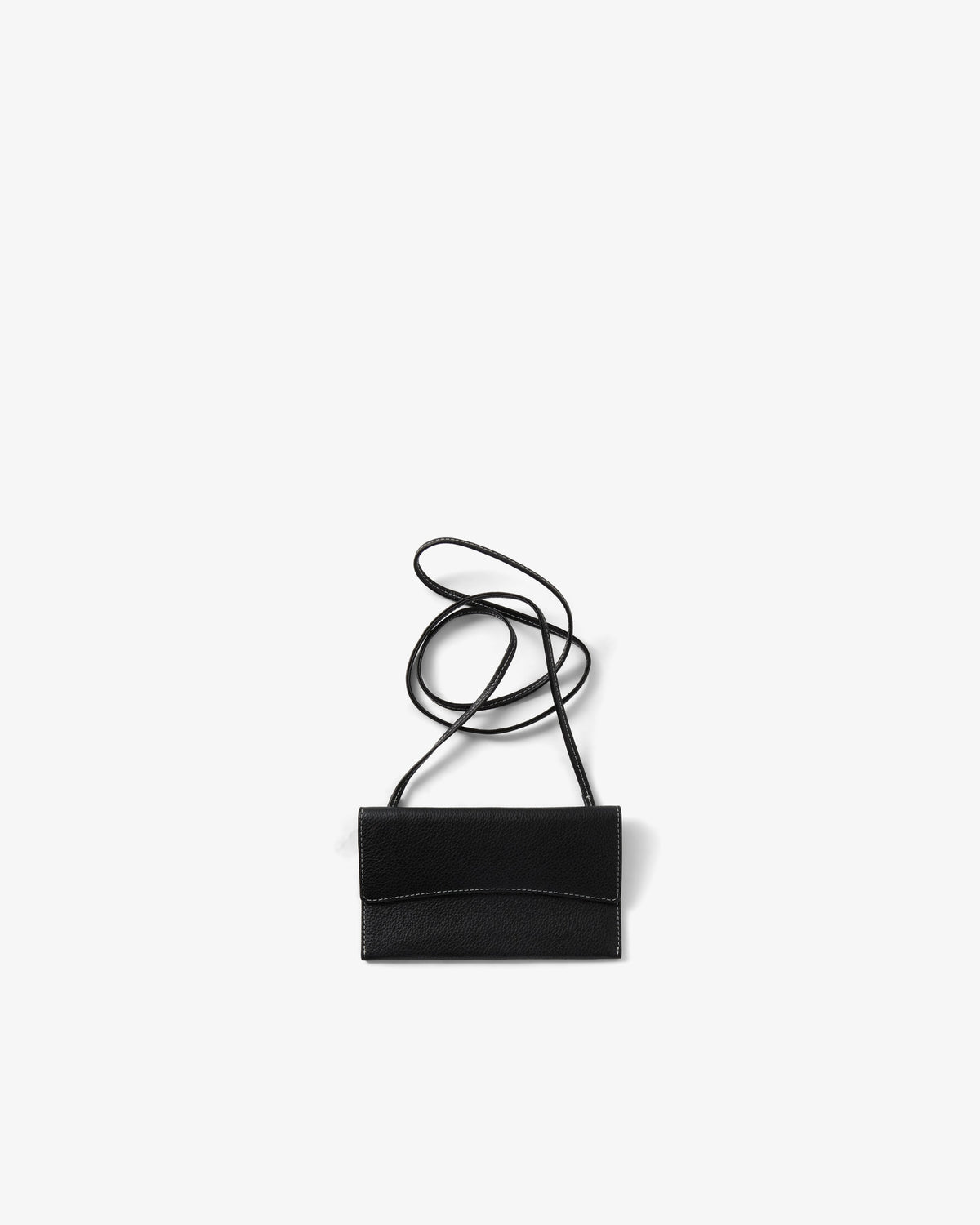A small black leather crossbody bag with a long thin strap, photographed flat against a light gray background.
