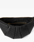 Black pleated leather bag with gold-tone zippers, shown open to reveal the interior lining and a zippered pocket.