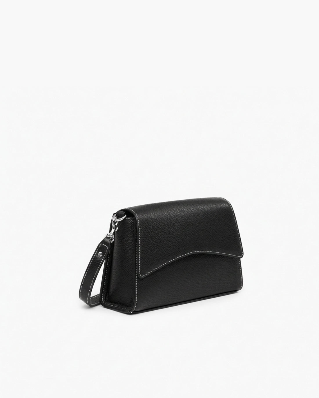 A black pebbled leather crossbody bag with a cross body strap and silver hardware, photographed on a clean white background.