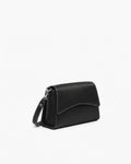 A black pebbled leather crossbody bag with a cross body strap and silver hardware, photographed on a clean white background.