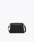A black leather cross body bag with contrast stitching, silver hardware and an adjustable cross body strap, shown from the back against a white background. 
