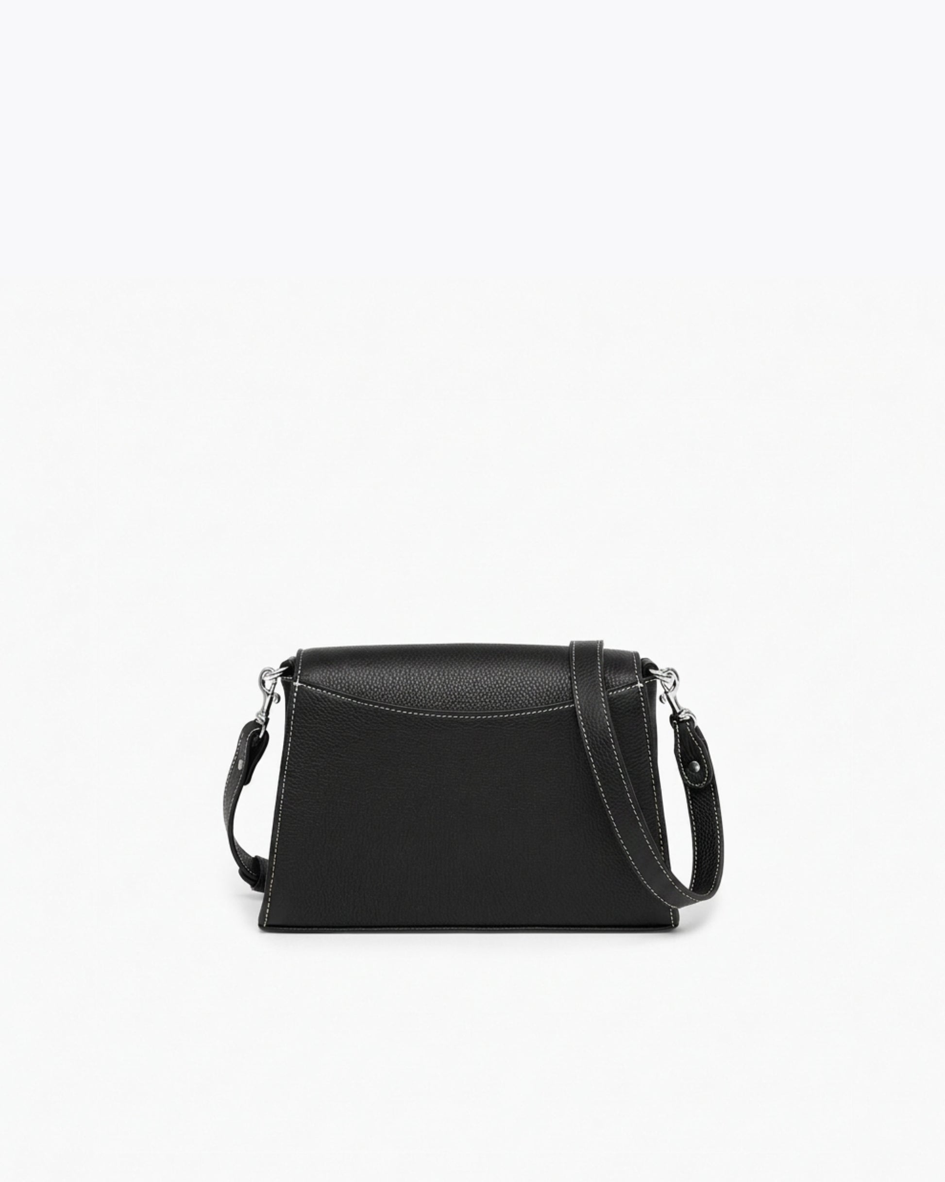 A black leather cross body bag with contrast stitching, silver hardware and an adjustable cross body strap, shown from the back against a white background. 