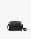 A black pebbled leather crossbody bag with a curved front flap and a detachable shoulder strap, shown against a plain white background.