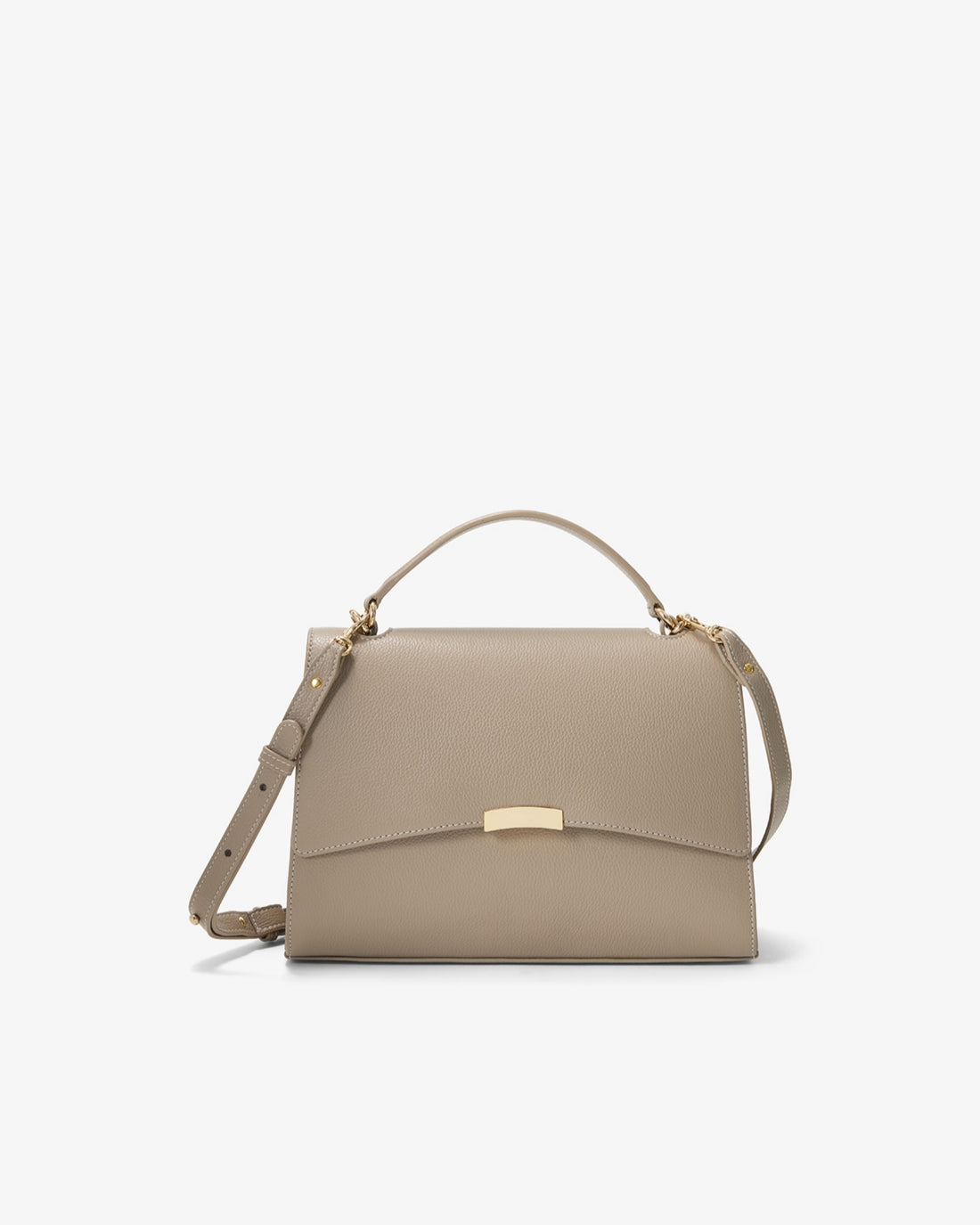 A structured top-handle handbag in light taupe leather with a gold-tone front clasp and matching shoulder strap, photographed on a clean white background.