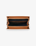 A tan leather zippered pouch or organizer shown open from a top-down view, revealing a dark navy interior lining and multiple internal pockets, set against a plain light gray background.