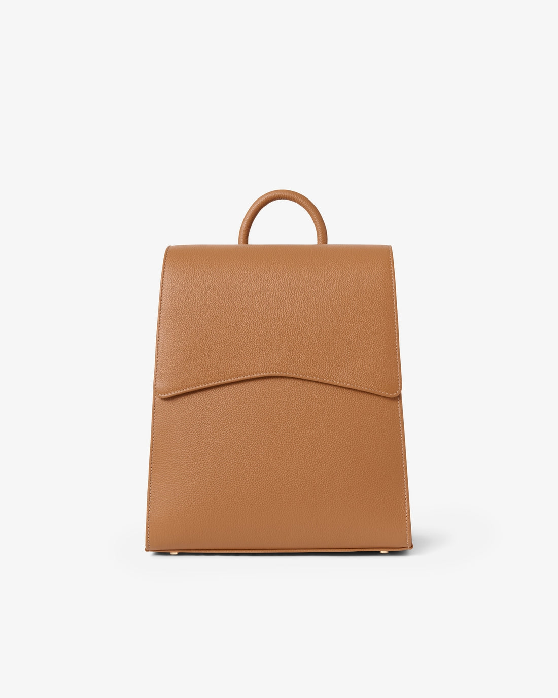 A tan leather backpack with a top handle, shown from the front against a plain white background.