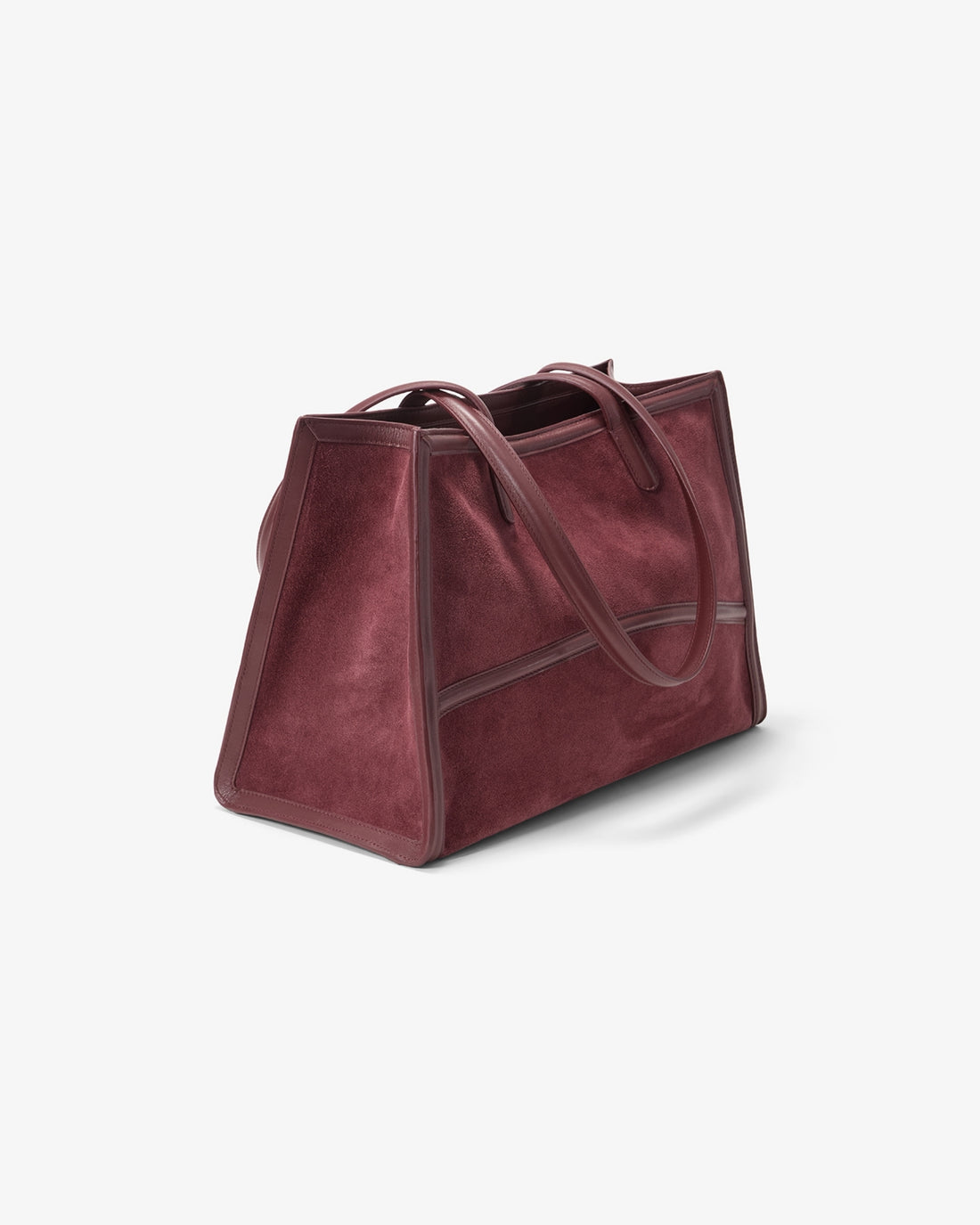 A large structured tote bag in a deep burgundy suede material, shown from a three-quarters angle on a clean white background.