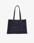 A navy blue suede tote bag with black leather trim and double shoulder straps, shown against a plain white background.