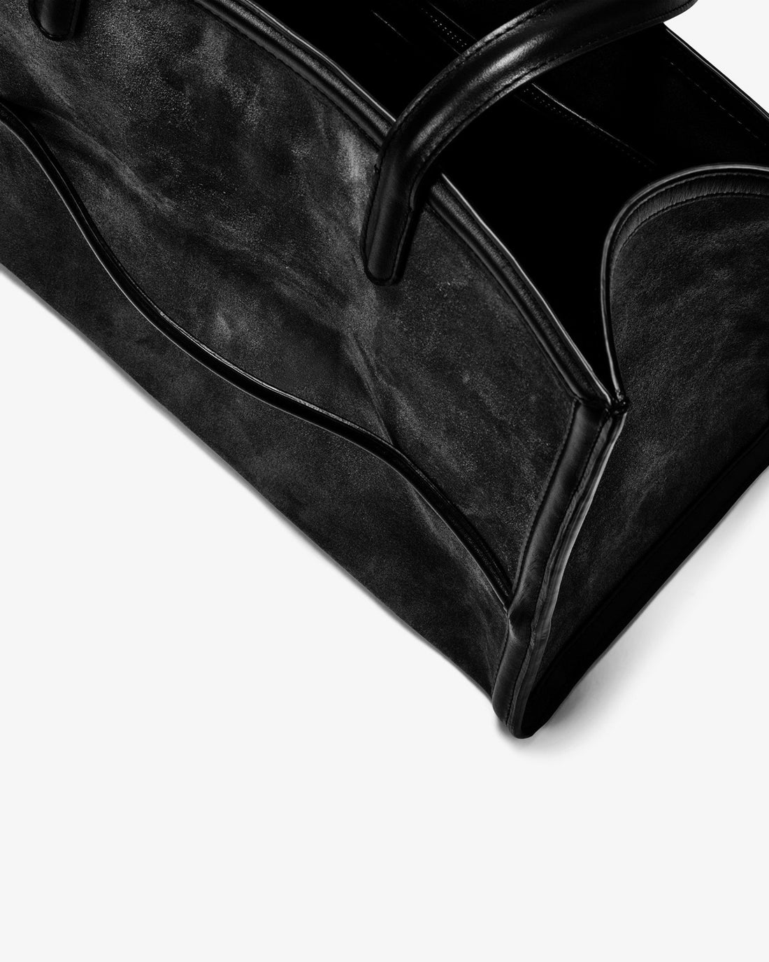 A black tote bag with a matte finish and double shoulder straps, shown against a plain white background.