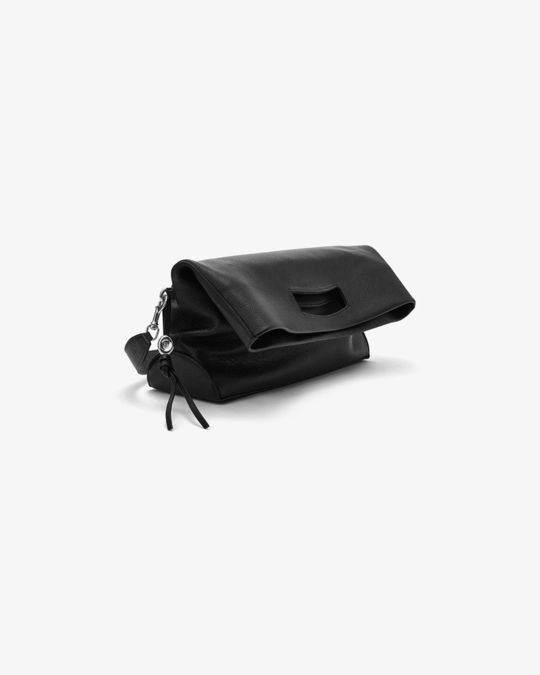 A black leather tote bag, folded and standing in an angle. 