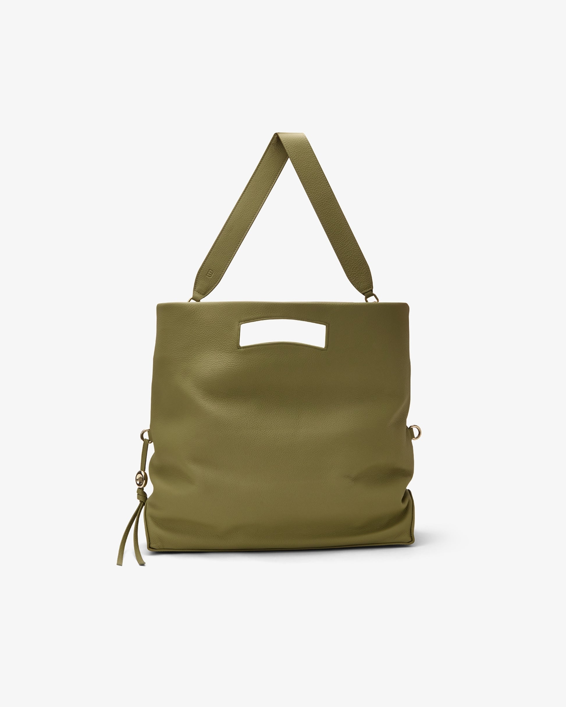An olive green leather tote bag with a wide shoulder strap, a rectangular cutout handle on the front, and a small tassel detail on the left side, shown against a plain light gray background.