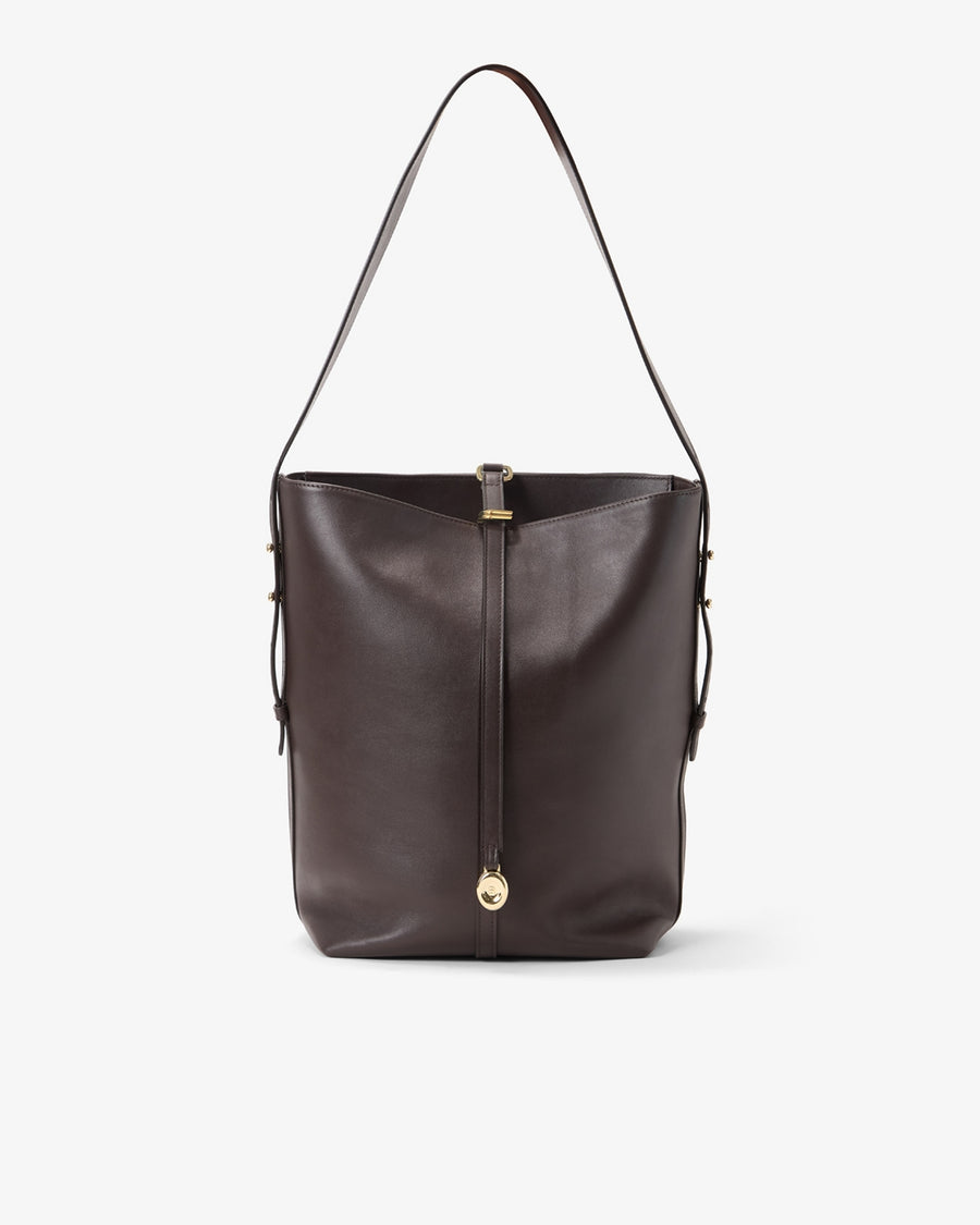 A dark brown leather bucket bag with a single shoulder strap and gold-tone hardware, shown against a plain light gray background.