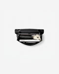 A black leather zippered briefcase shown open from a top-down view, revealing an iPad, a cable pocket and other small accessories inside, set against a plain white background.