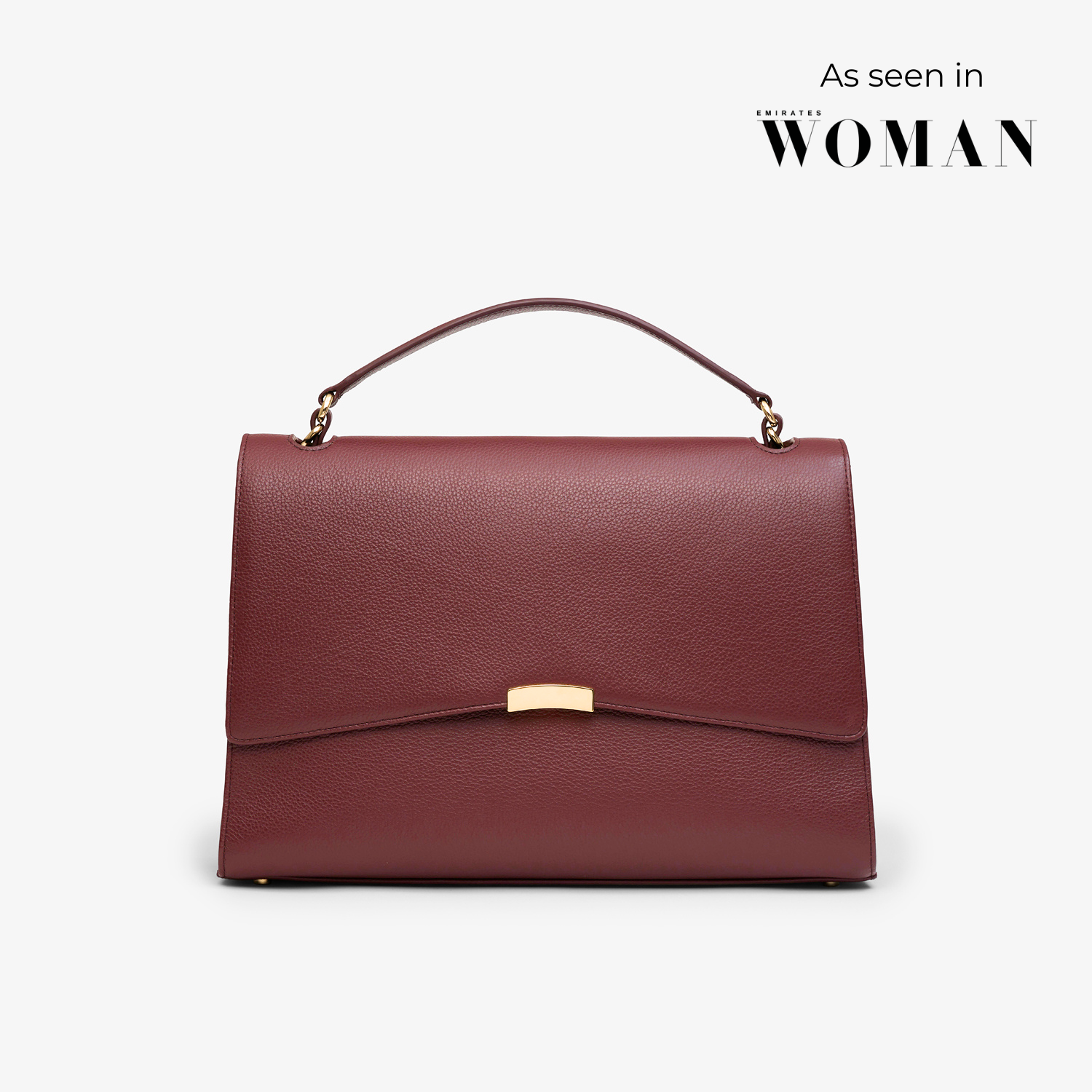 Signature Briefcase in burgundy/gold with structured silhouette and gold hardware – elegant work bag crafted from premium pebbled leather.