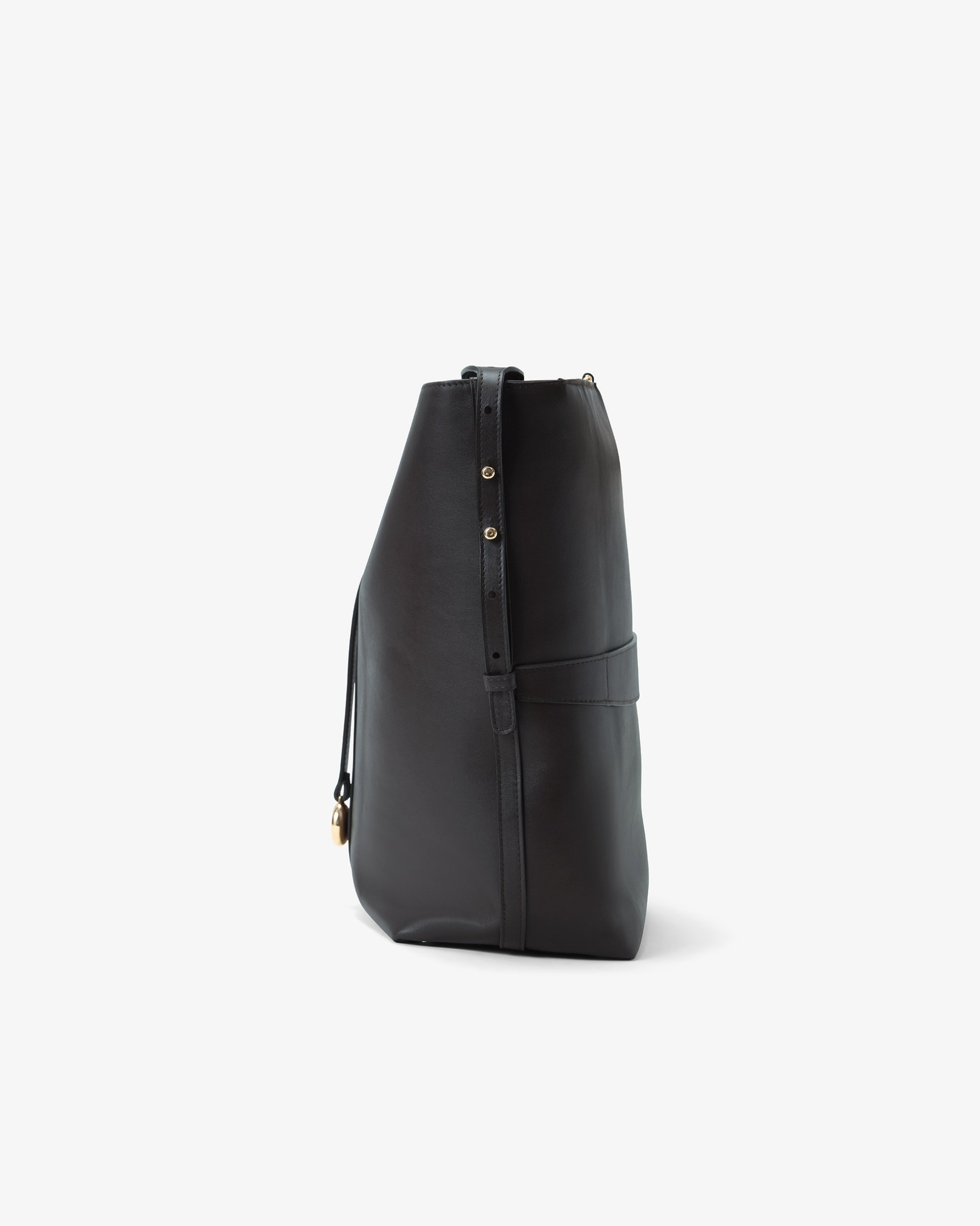 A black leather slouchy shoulder bag with gold-tone hardware, shown from a side profile view against a light gray background.