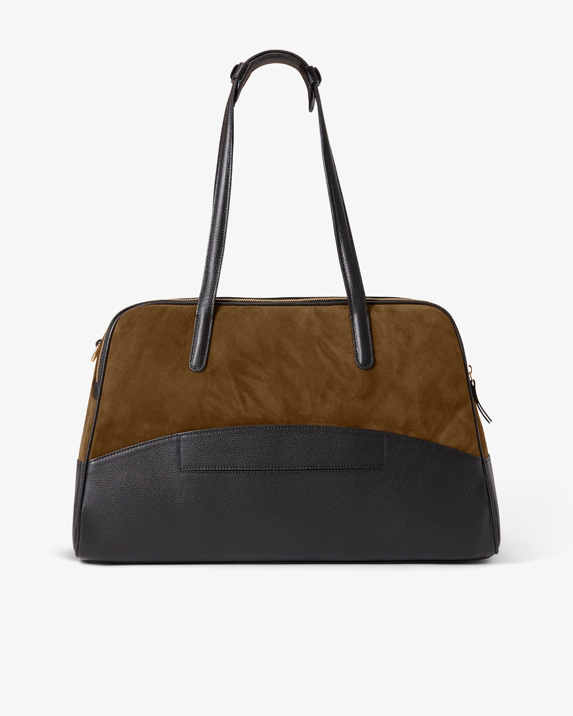 A color-blocked leather and suede duffel bag with a brown suede upper section, a black leather lower section, and a luggage strap and black leather handles, shown against a plain white background.