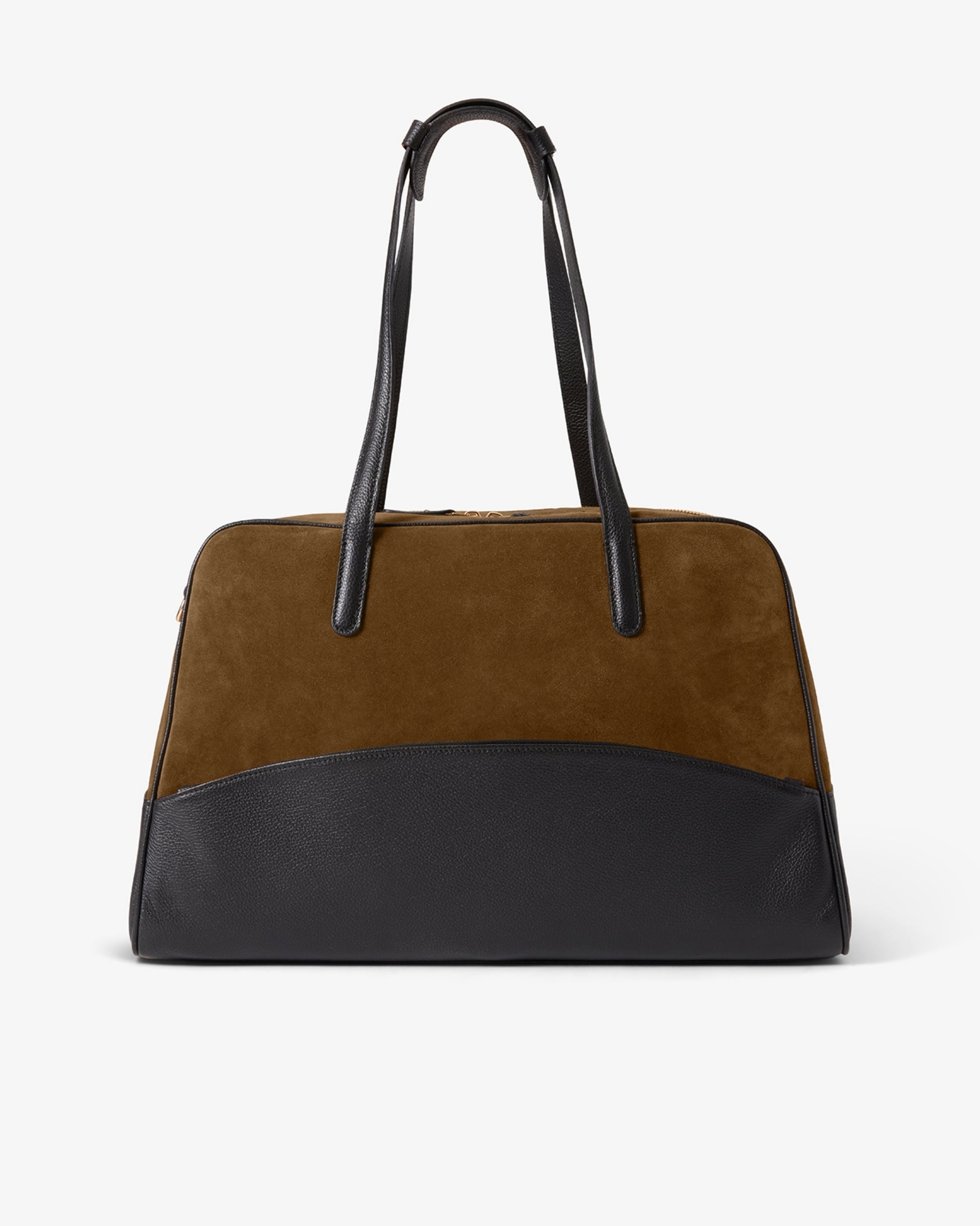 A color-blocked leather and suede duffel bag with a brown suede upper body, a black leather lower base, and black leather handles, shown against a plain white background.