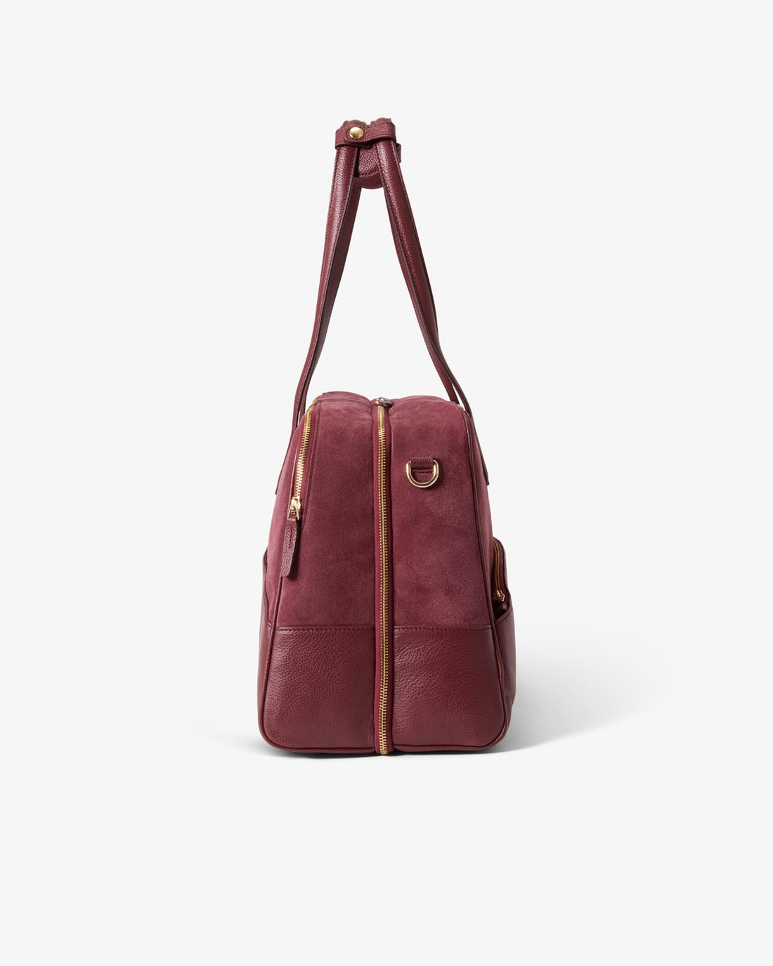 A burgundy leather duffel bag with gold-tone hardware, shown from the side on a clean white background.