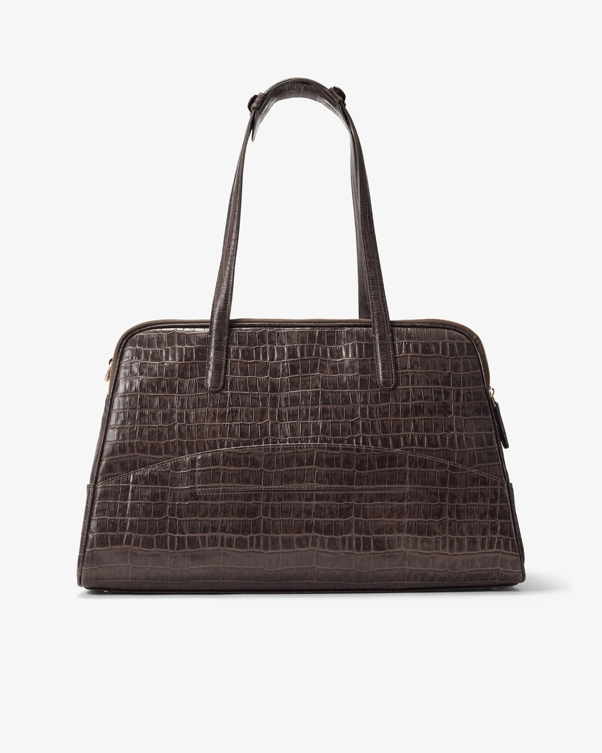 A dark brown crocodile-embossed leather handbag with dual top handles and a luggage strap, shown from the back against a plain light gray background.