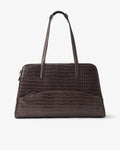 A dark brown crocodile-embossed leather tote bag with dual shoulder straps, shown against a plain light gray background.