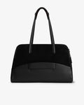 A black leather and suede handbag with dual top handles, a structured dome shape, and a luggage strap, shown from the back against a plain white background.