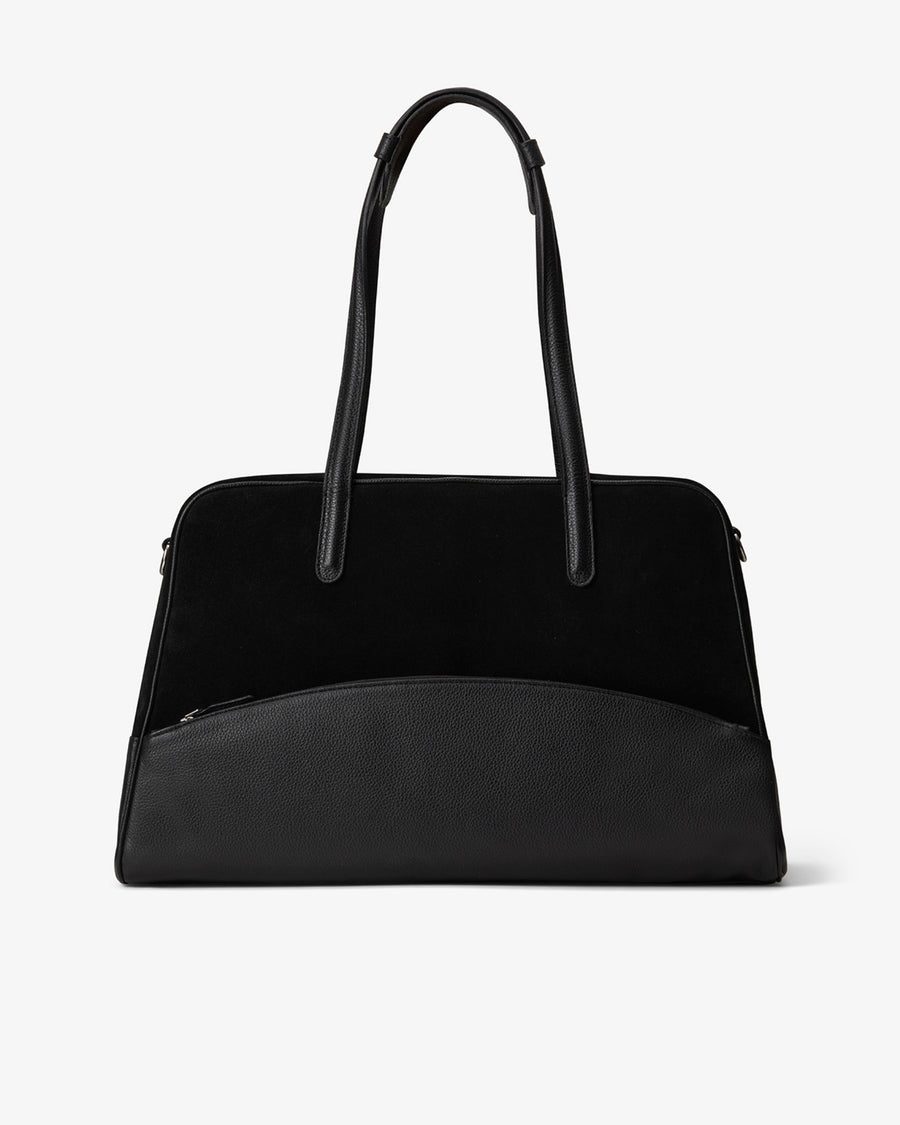 A black leather handbag with a structured dome shape, dual top handles, and a curved front pocket, shown against a plain white background.