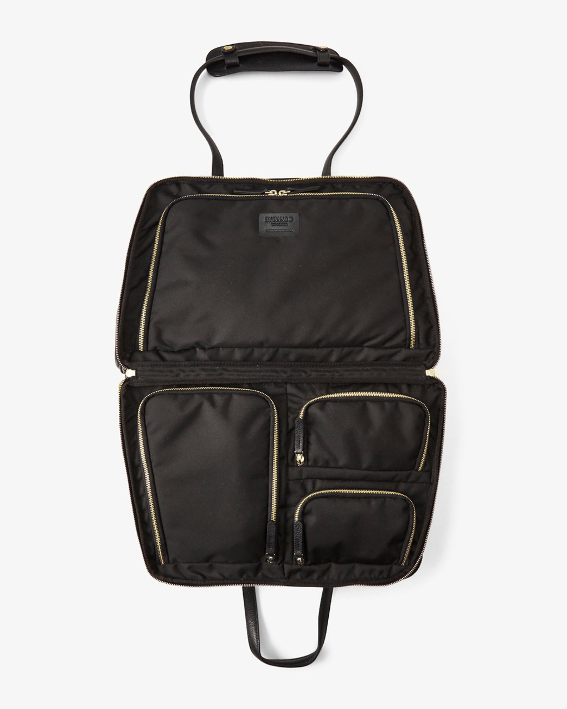 A black nylon laptop sleeve with gold zipper accents, shown open to display its interior compartments and a top handle, set against a plain light gray background.