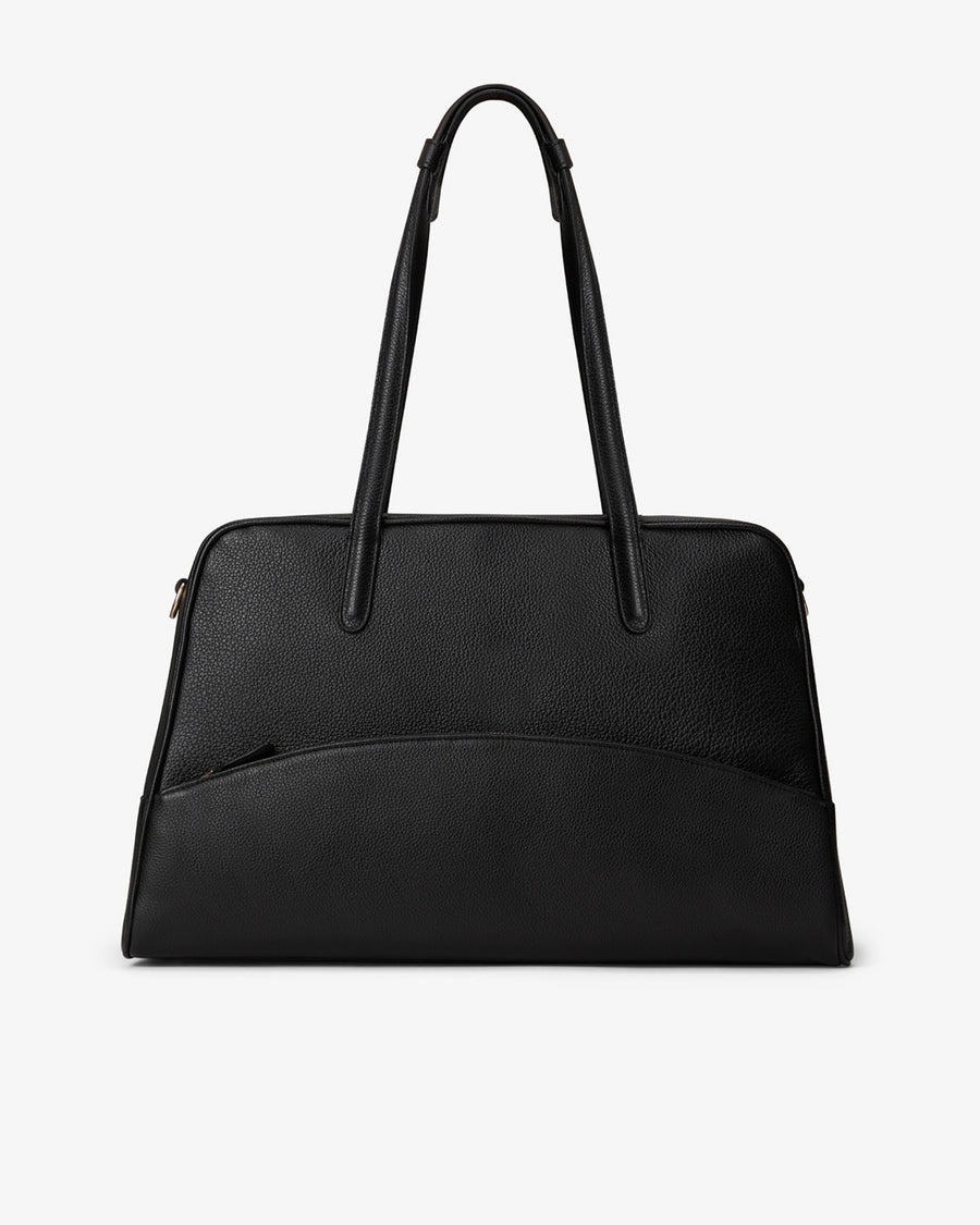 A black pebbled leather handbag with dual top handles and a curved front pocket, shown against a plain white background.