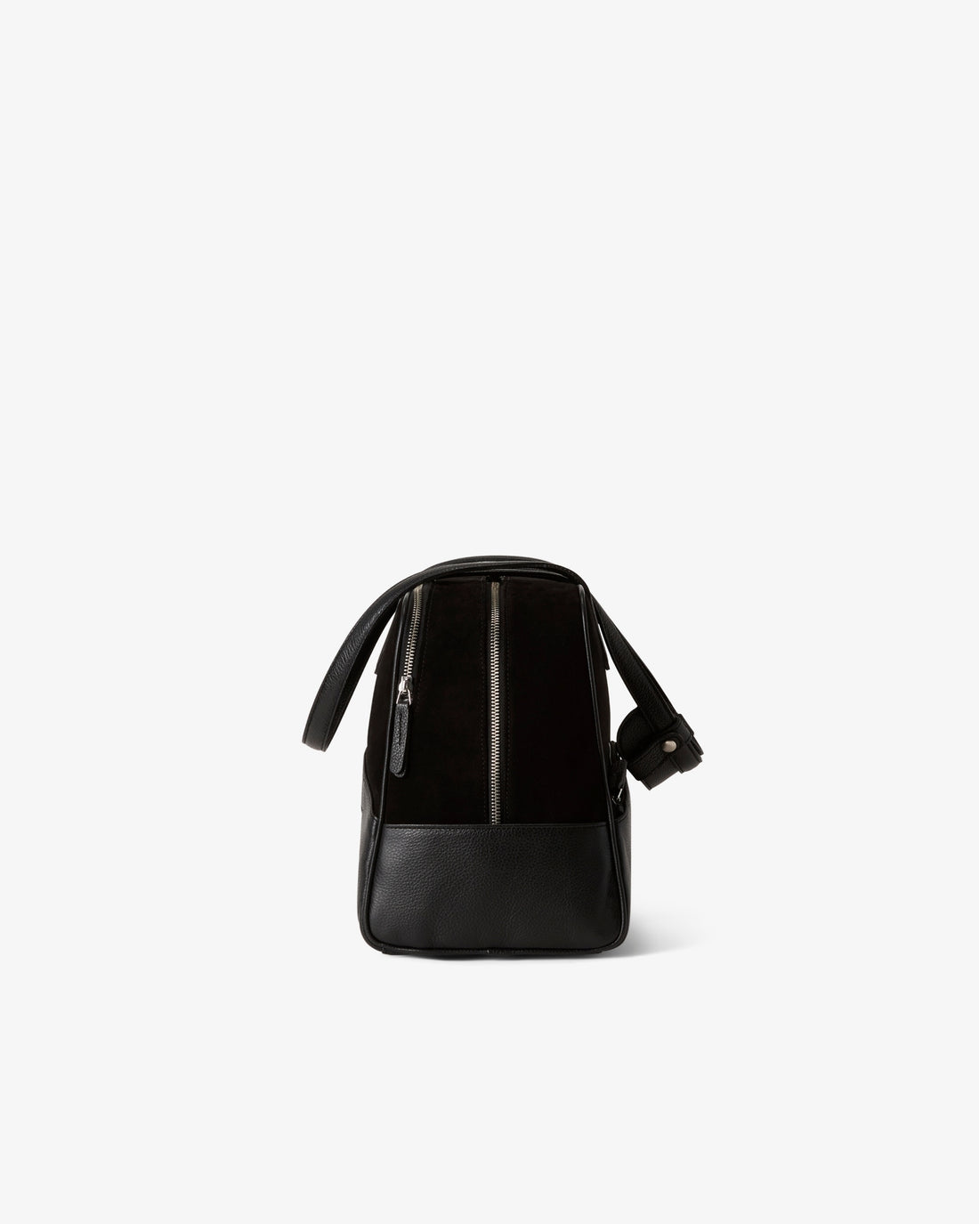 A black leather shoulder bag with a structured rectangular shape, featuring a vertical zippered pocket on the side and a small black leather pad attached on the straps, shown against a plain white background.