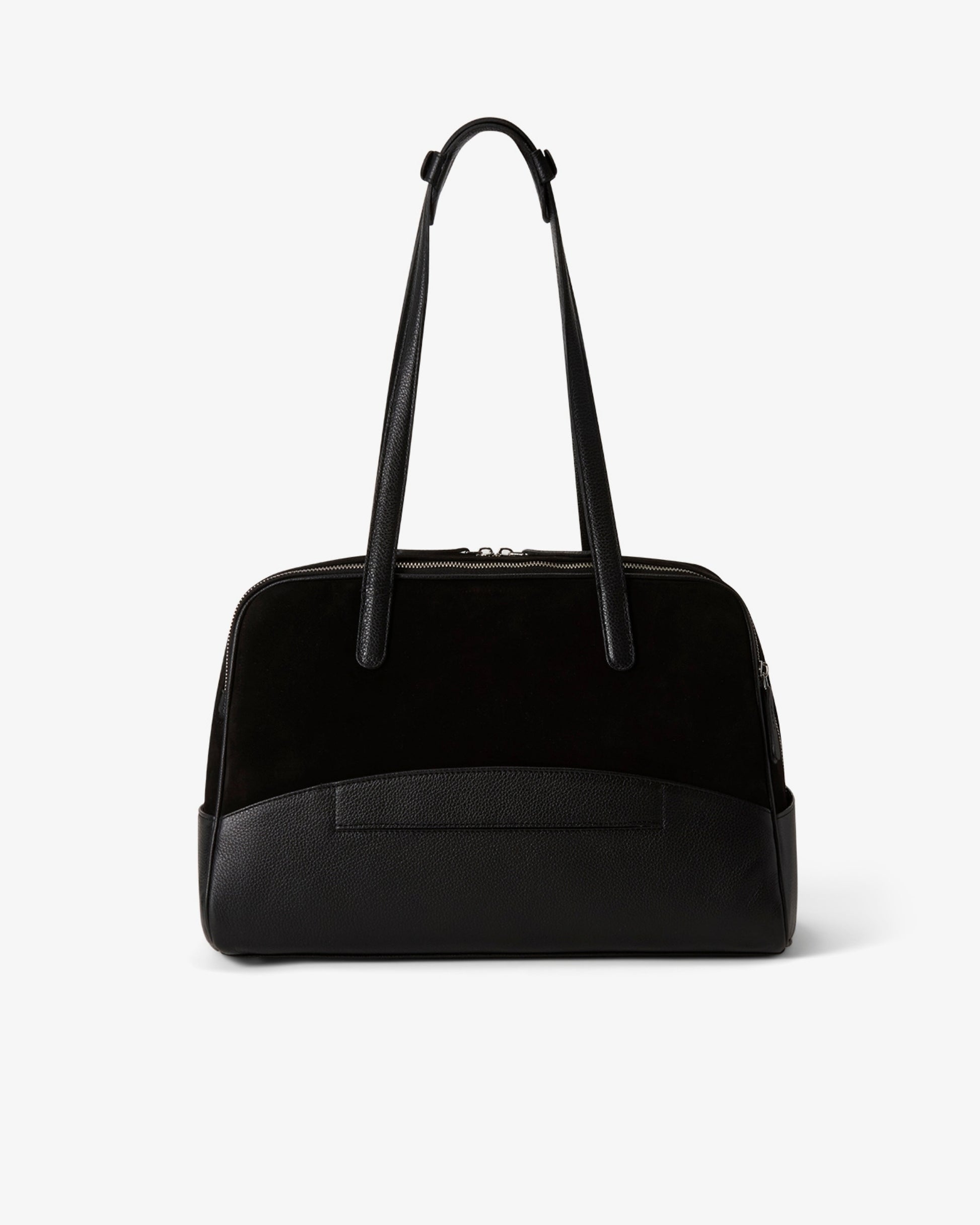 A black structured handbag with a smooth leather front base, a black suede upper section, and dual shoulder straps, shown against a plain light gray background.