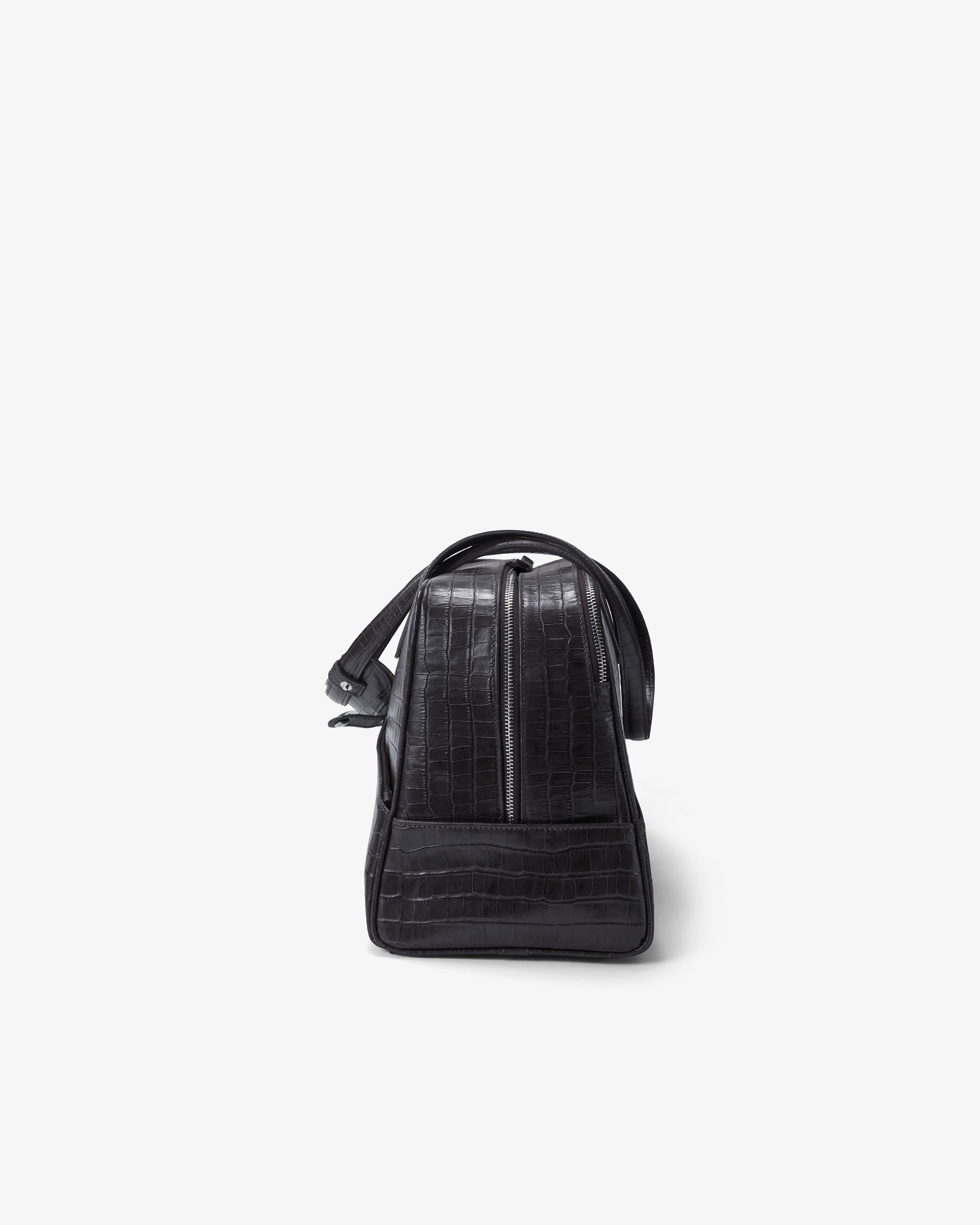 A black crocodile-embossed leather bag shown from the back against a plain white background.