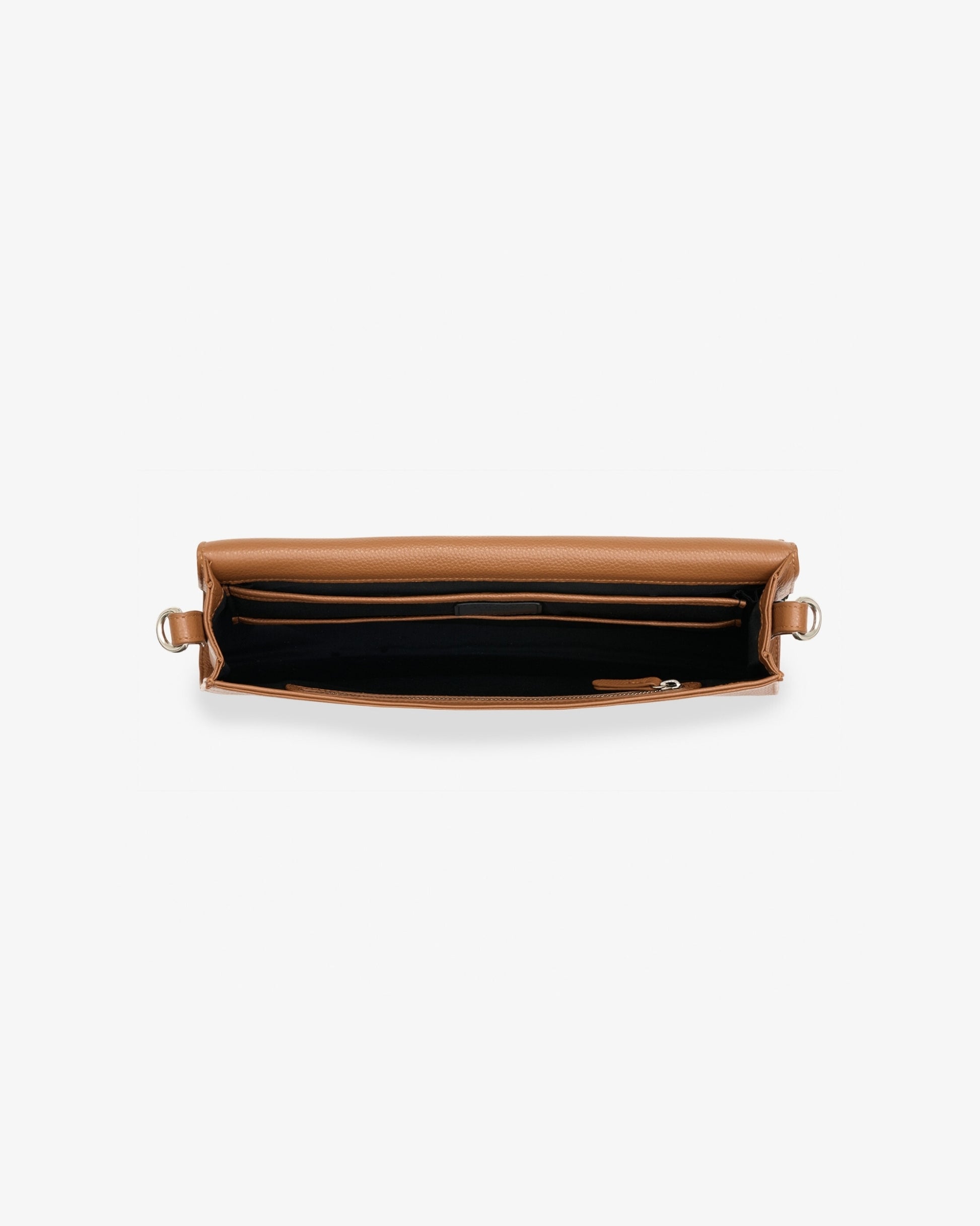 A top-down view of a tan leather handbag with a black interior lining and gold-tone hardware, shown on a plain light gray background.