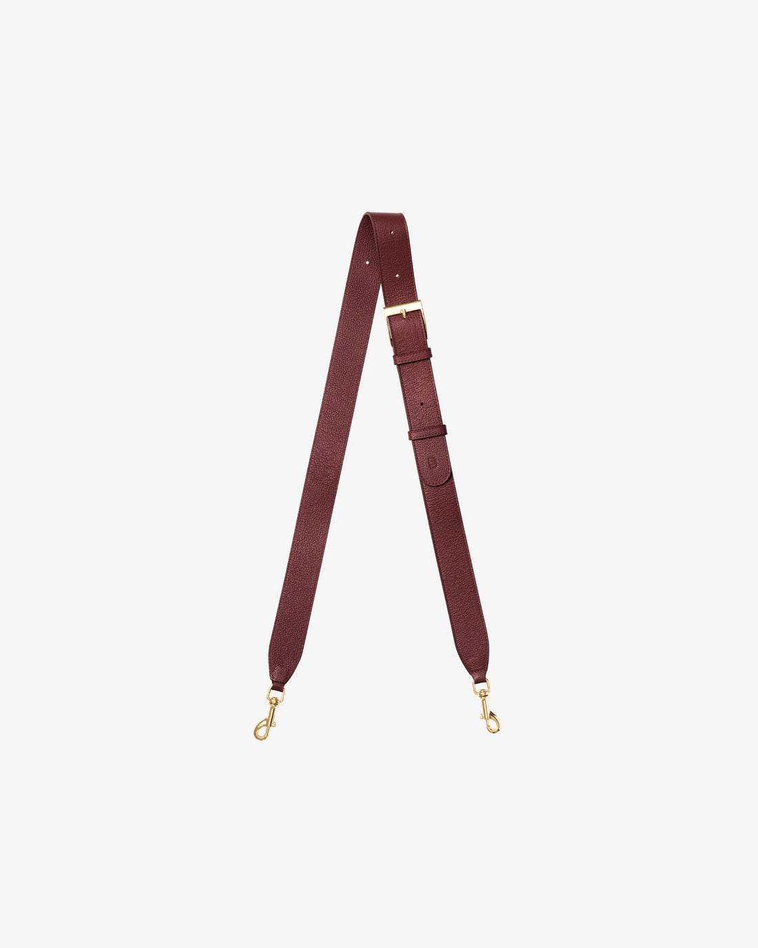 A burgundy leather shoulder strap with gold-tone metal hardware, including a buckle, adjustment loops, and two swivel snap hooks, displayed on a light gray background.