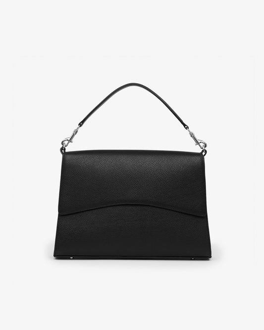 A black textured leather shoulder bag with a curved flap and a thin black strap attached by silver-tone hardware, shown against a plain white background.