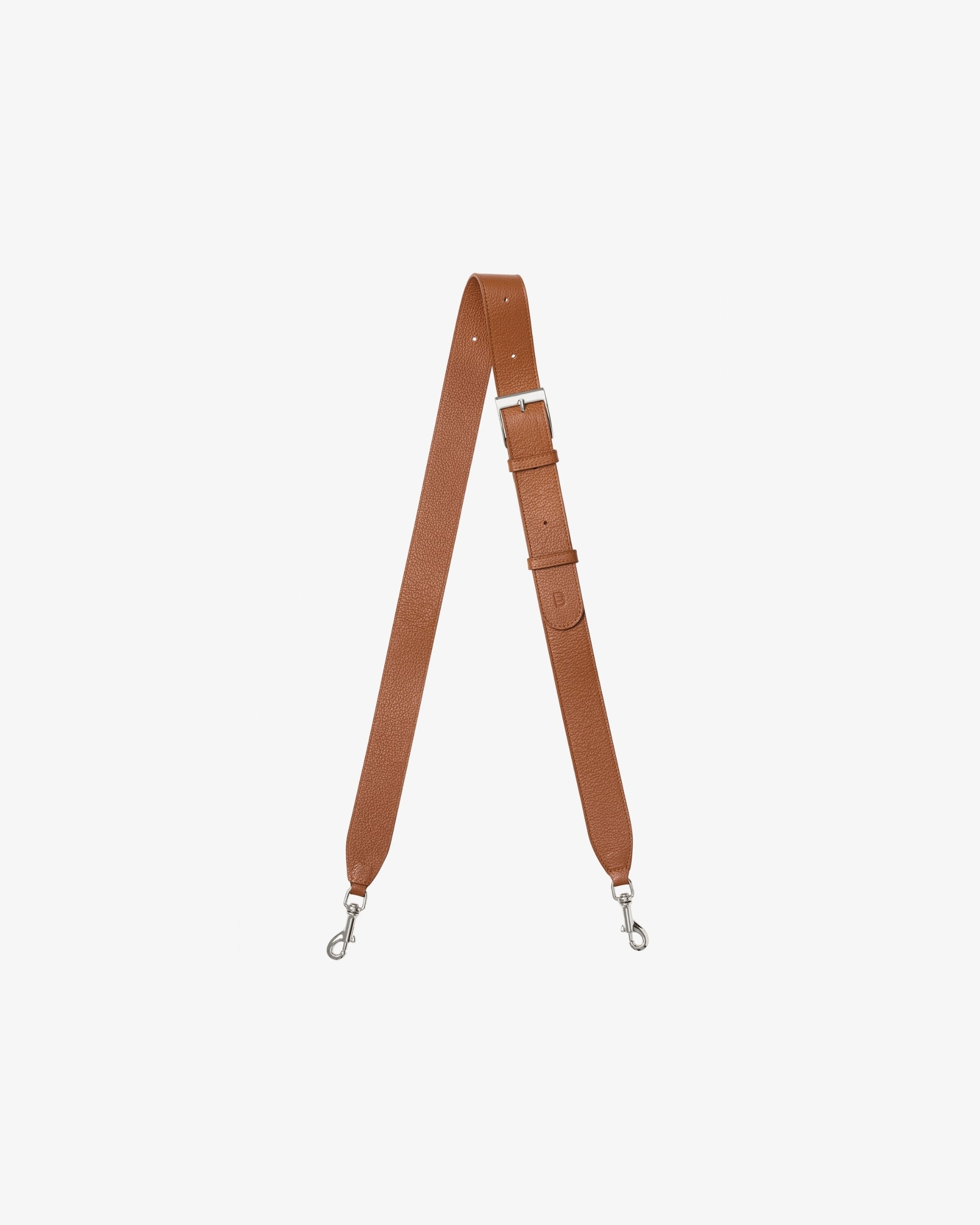 A tan leather shoulder strap with silver metal hardware, shown vertically on a light gray background.