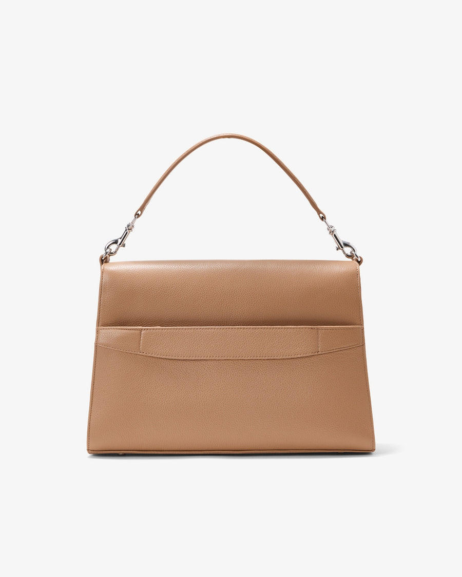 A structured tan leather handbag with a top handle and silver-tone hardware, featuring a luggge strap, shown against a plain white background.