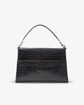 A black crocodile-embossed leather handbag with a structured rectangular shape, a single top handle, silver-tone hardware, and a luggage strap, shown against a plain white background.
