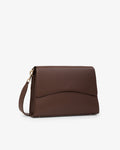 A dark brown leather clutch bag with a curved front flap and a matching shoulder strap, shown on a clean white background.