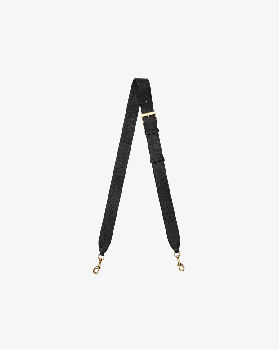 A dark brown leather cross body strap with gold-tone metal hardware, including a buckle, adjustment loops, and two swivel snap hooks, displayed on a light gray background.