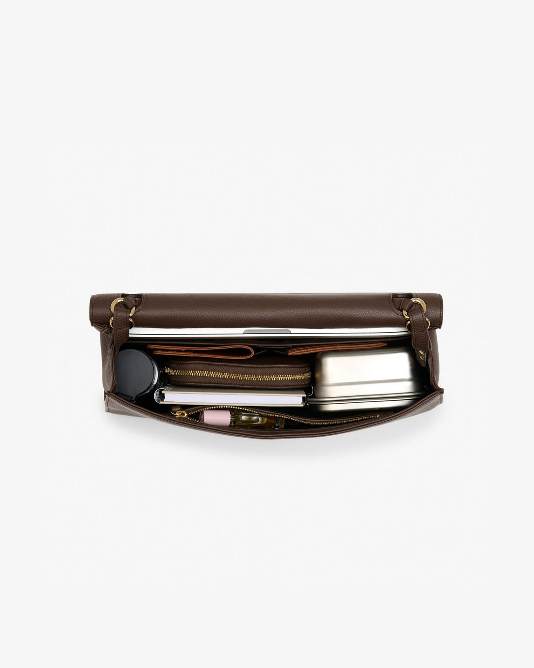 A dark brown leather briefcase shown open, revealing its interior storage compartments filled with travel accessories like a metal tin, notebook, and small items, set against a plain light gray background.