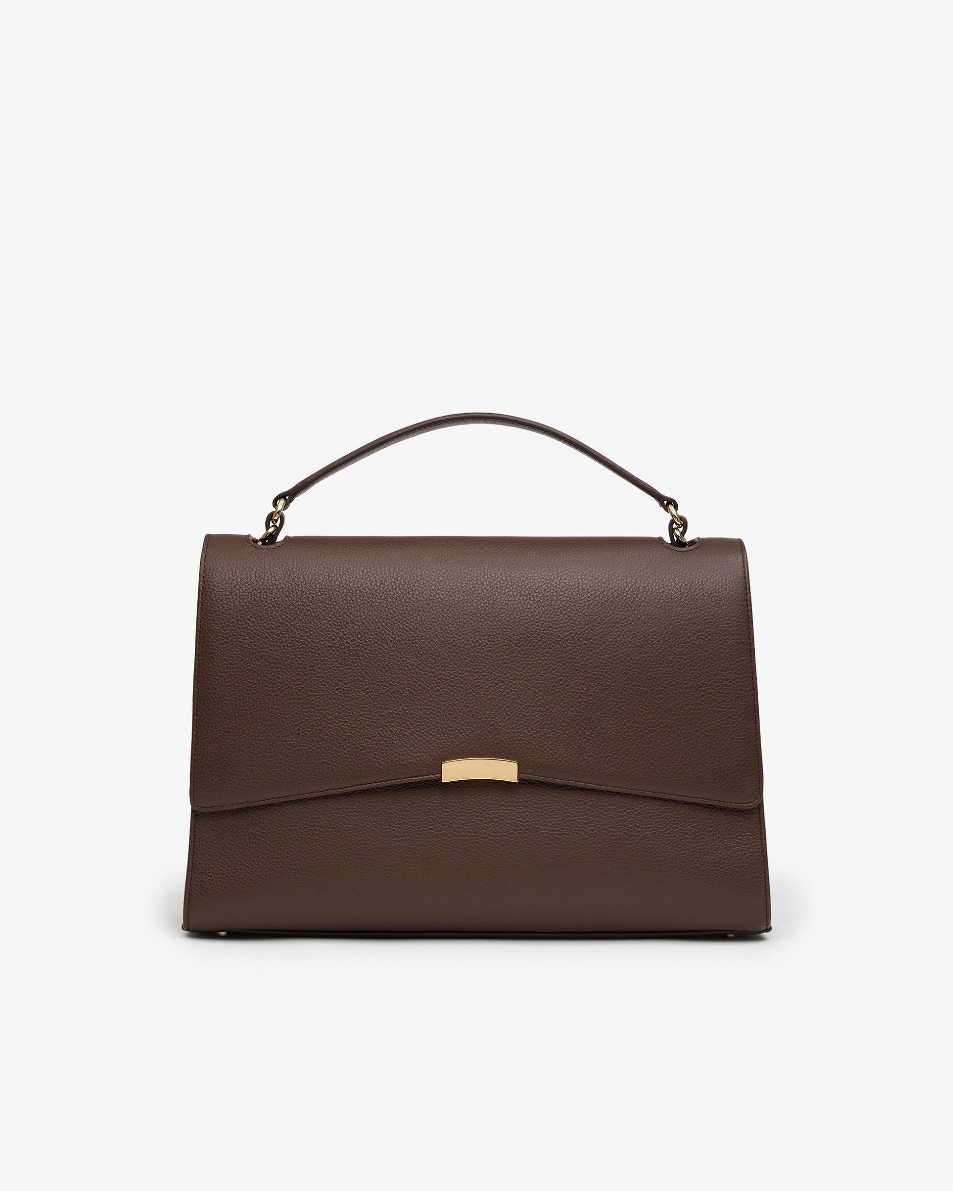 A dark brown textured leather handbag with a top handle and a gold-tone metal accent on the front flap, shown against a plain white background.