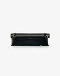 A black leather bag with silver-tone hardware, shown from the back against a plain white background.