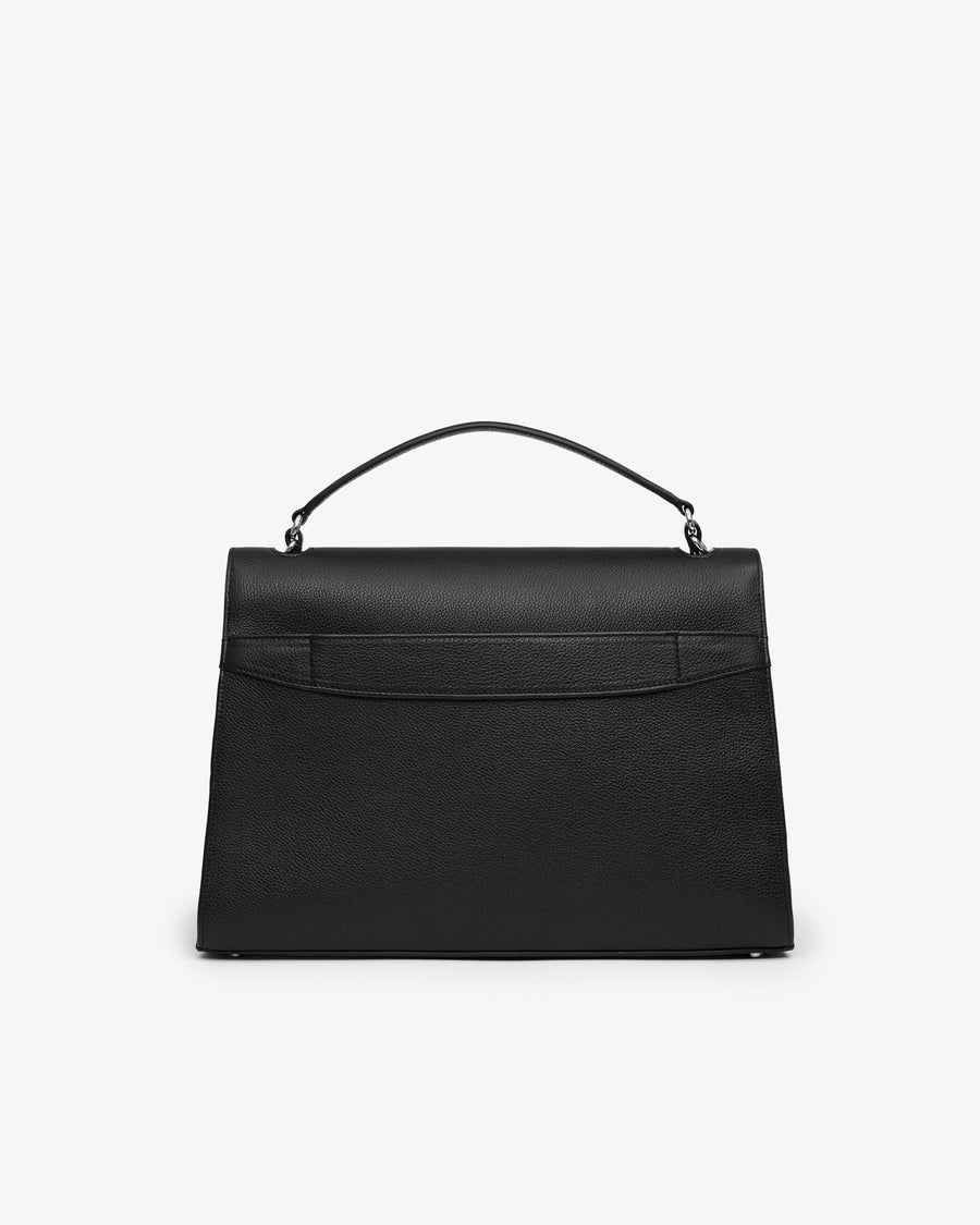 A structured black leather handbag with a top handle and a luggage strap, shown from the back against a plain white background.