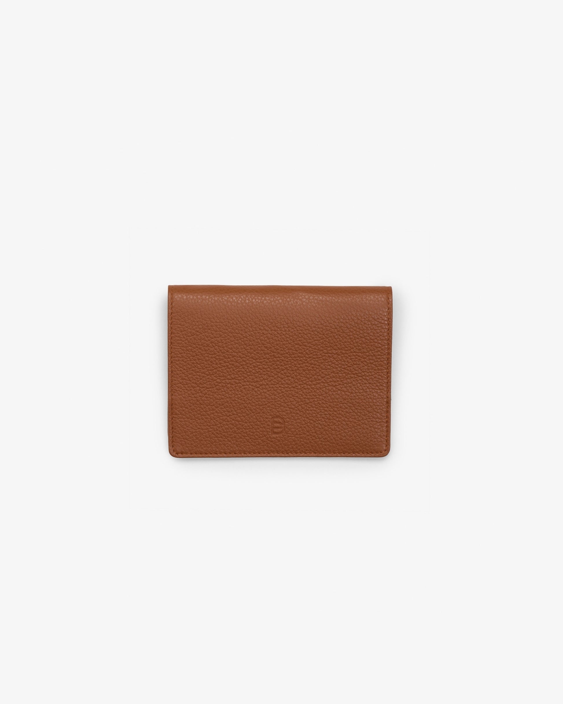 A brown textured leather bifold wallet with a embossed 'B' logo on the back, centered on a light gray background.