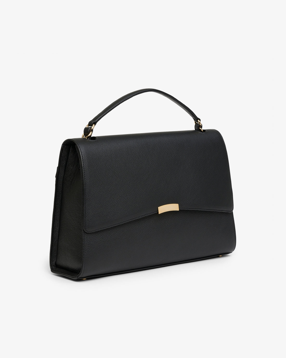 A black leather top-handle handbag with a gold-tone metal accent on the front flap, shown from a three-quarters angle against a plain white background.